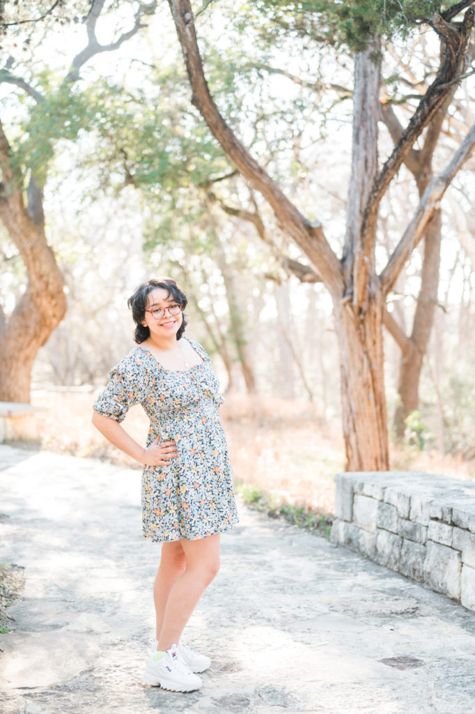 Wimberley High School senior by Blue Hole Park entrance