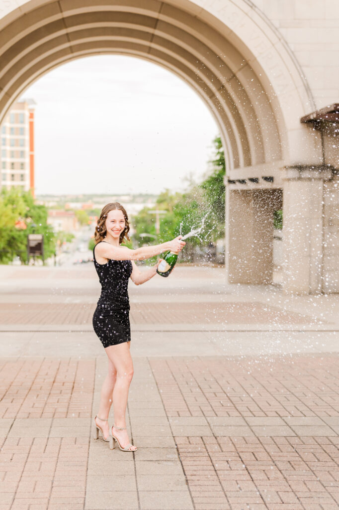 Texas State graduation photos, champagne pop 