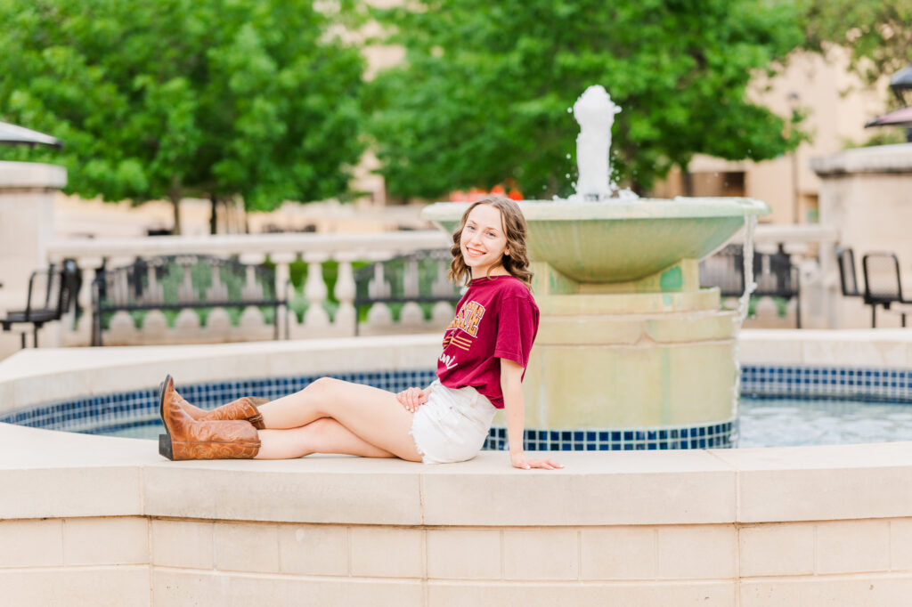 Texas state graduation photos by the fountain 