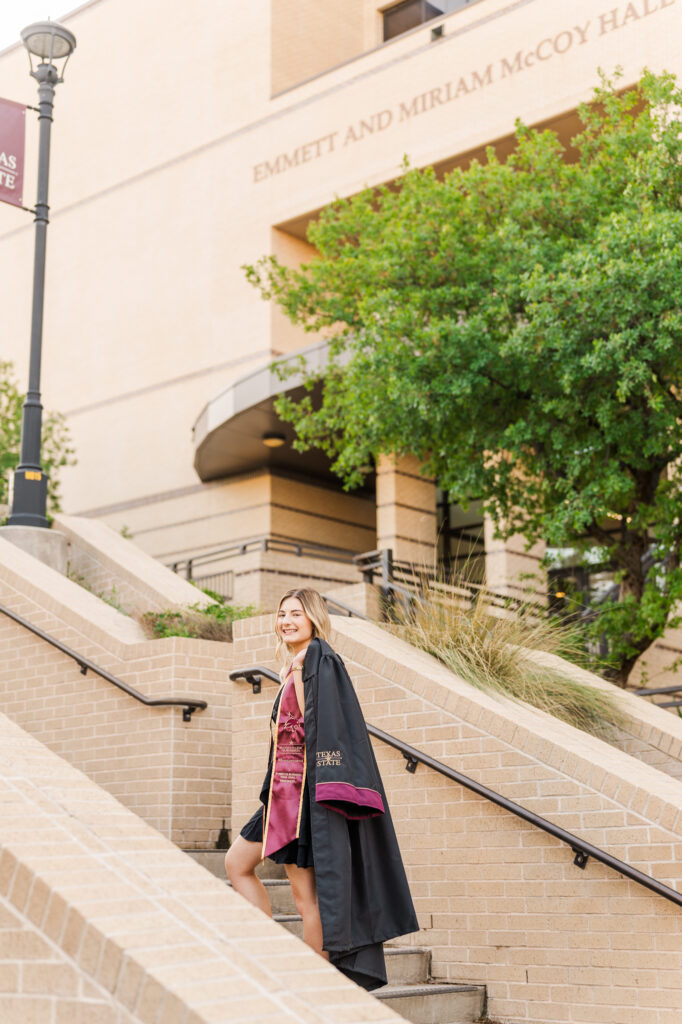 Texas State Graduation session. Taking photos at McCoy building. 