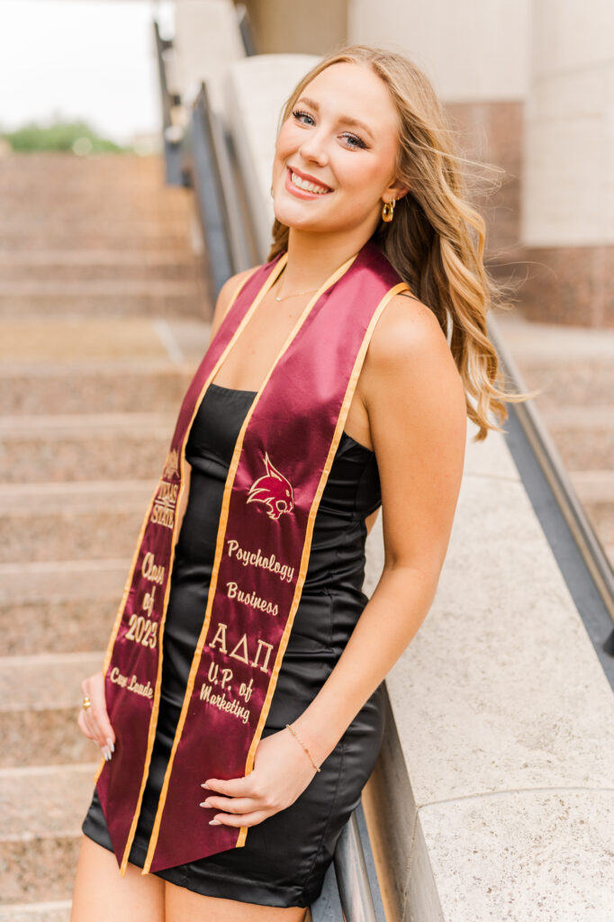 Texas State senior portraits on Alkek steps