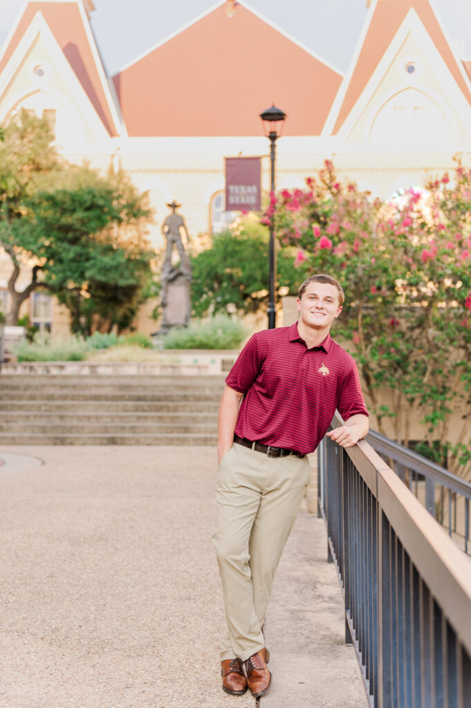 In front of Old Main for his Texas State University Portraits