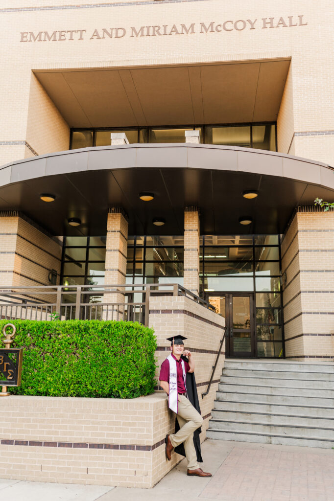 In front of McCoy building for Texas State University Portraits