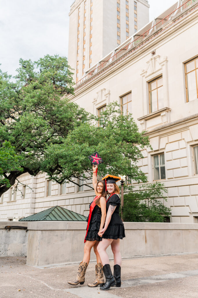 Friends posing for their UT Austin graduation session