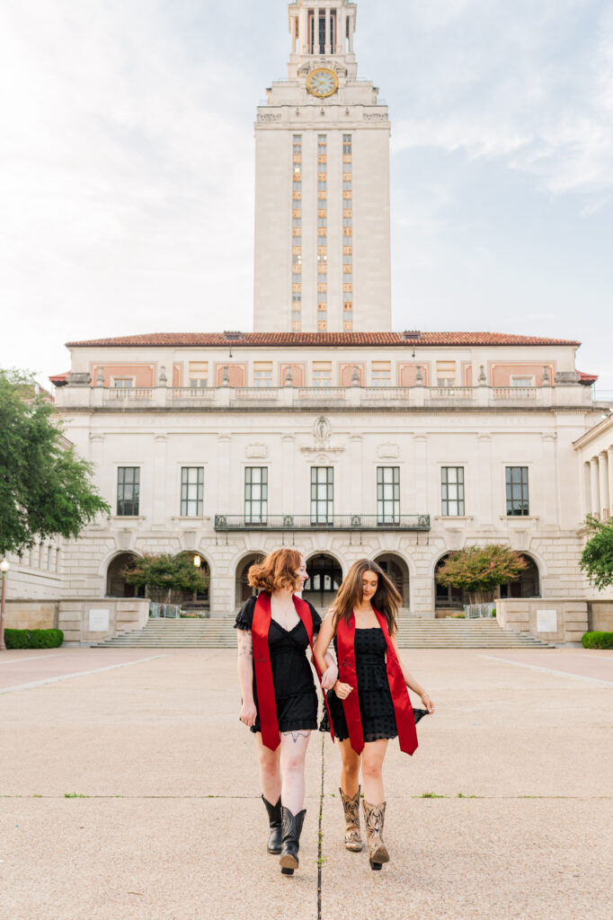 Friends in front of UT Tower during their graduation session
