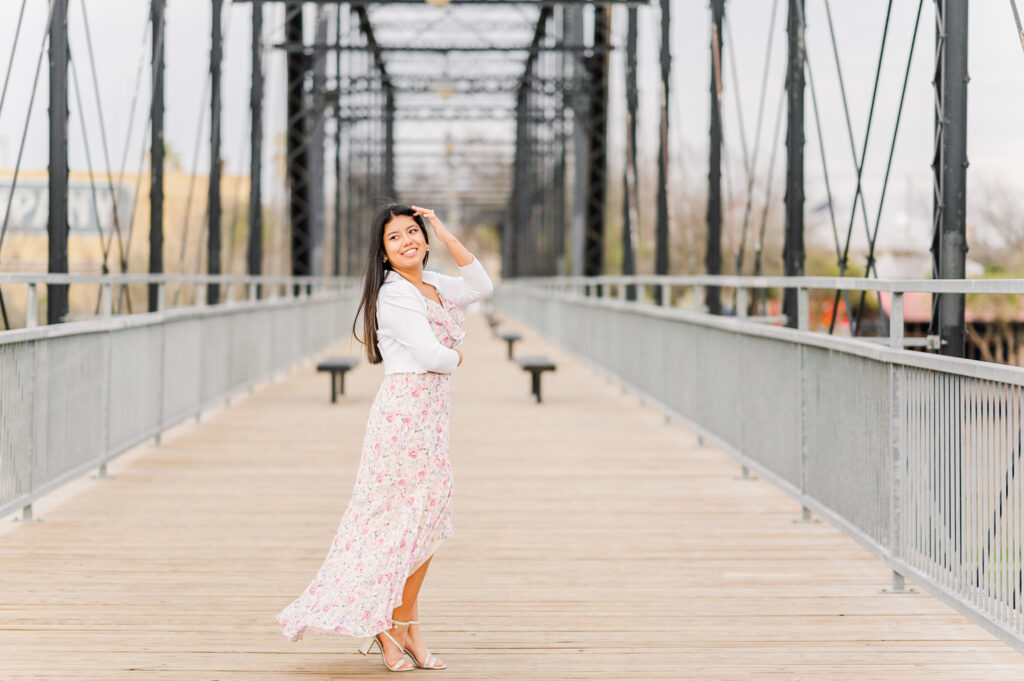 Posing on faust street bridge for her senior session 