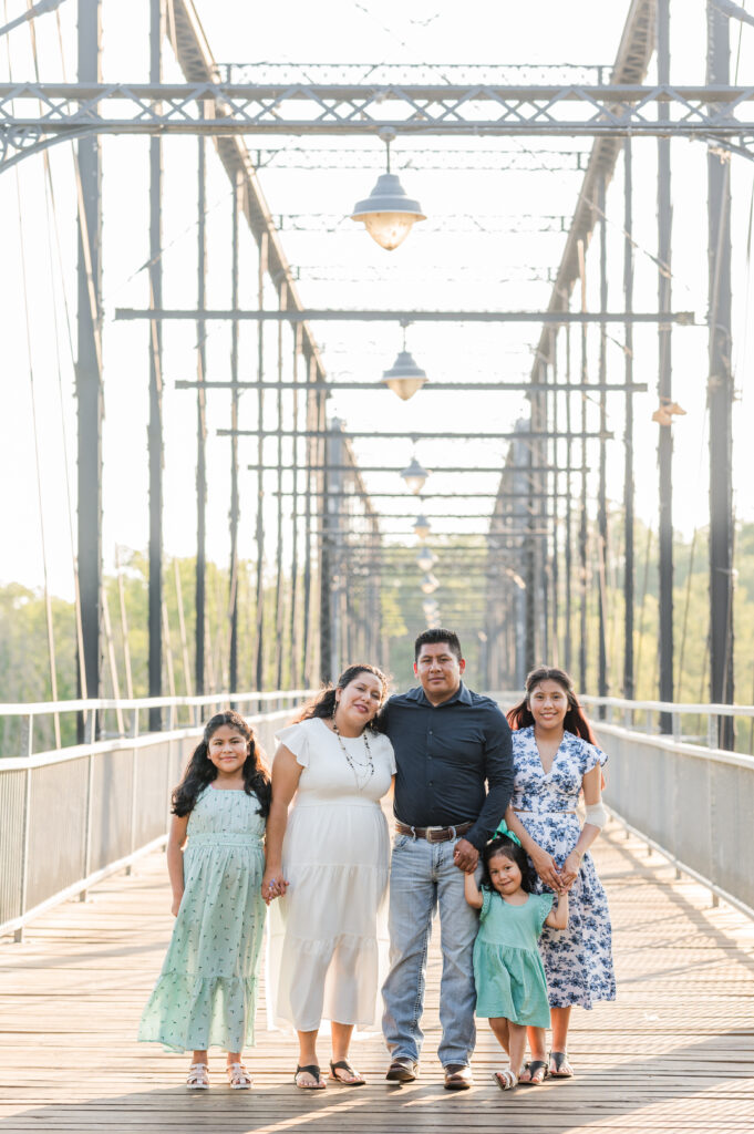 Family Poses on Faust Street Bridge