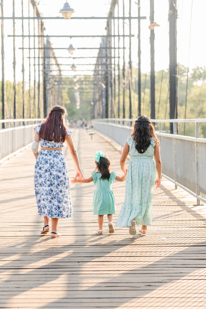 Children walking away on Faust Street Bridge