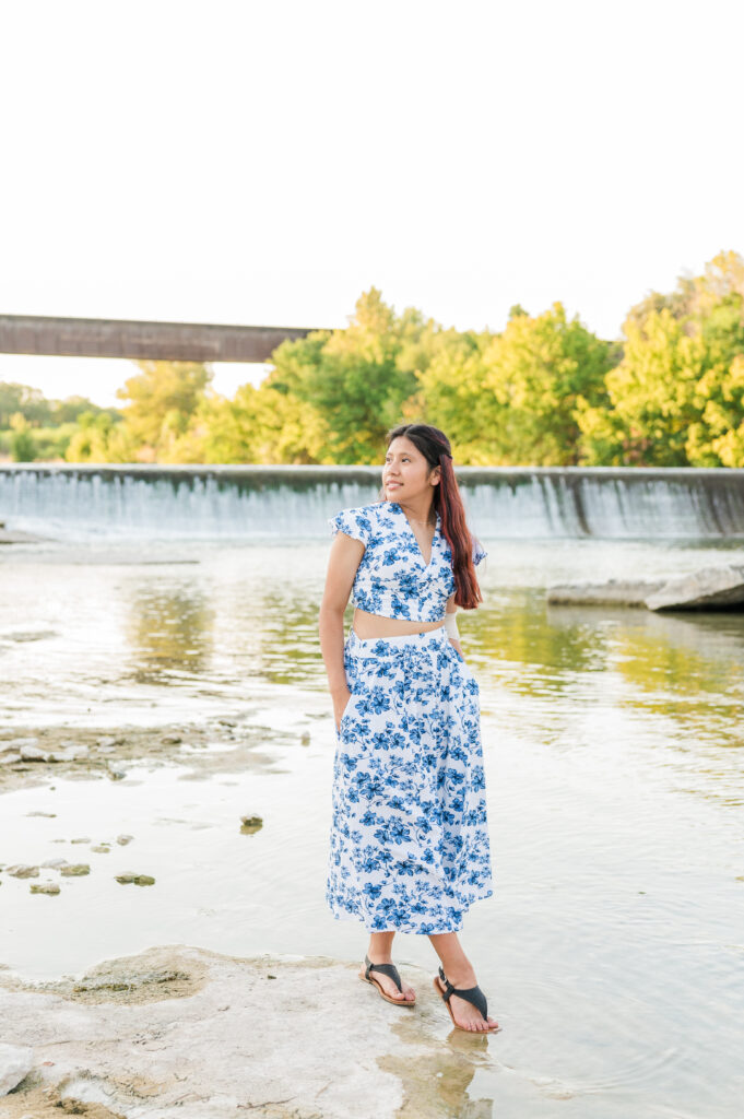 Individual portraits by the water under Faust Street Bridge 