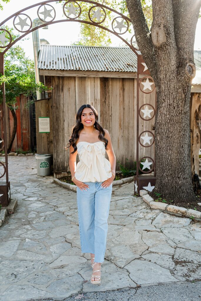 high school senior walking gruene hotel