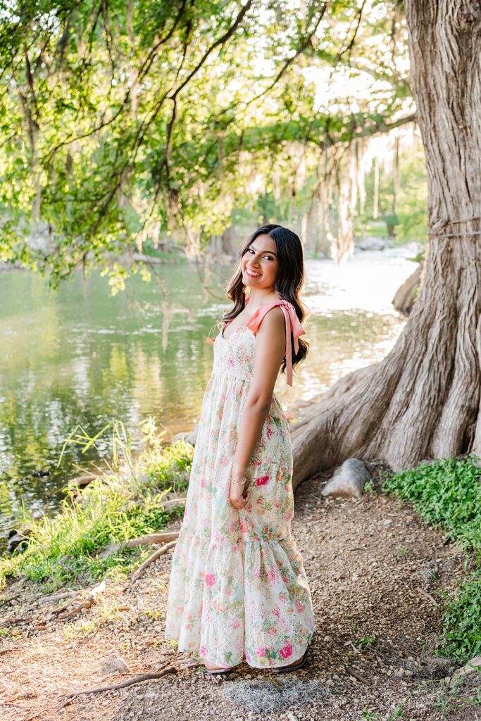 high school senior photo session by water in gruene